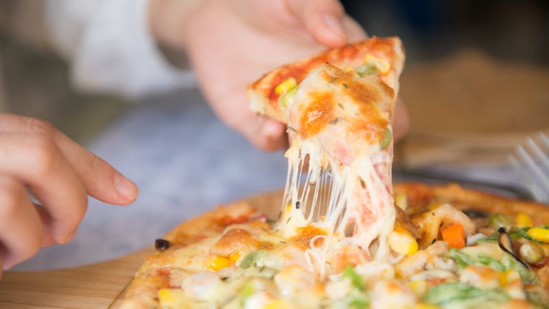 Colorful veggie garden pizza loaded with fresh vegetables at Jet's pizza