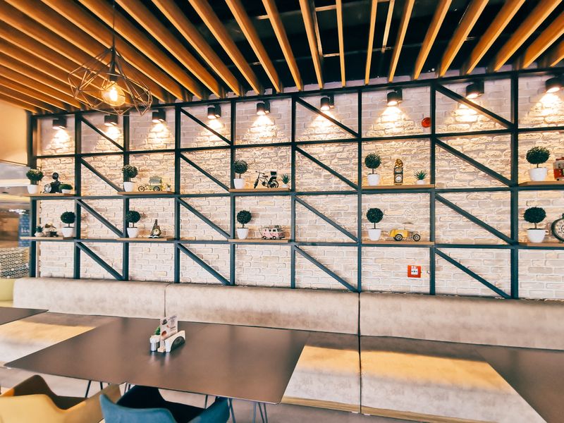Warm and inviting dining room interior at Jet's pizza restaurant